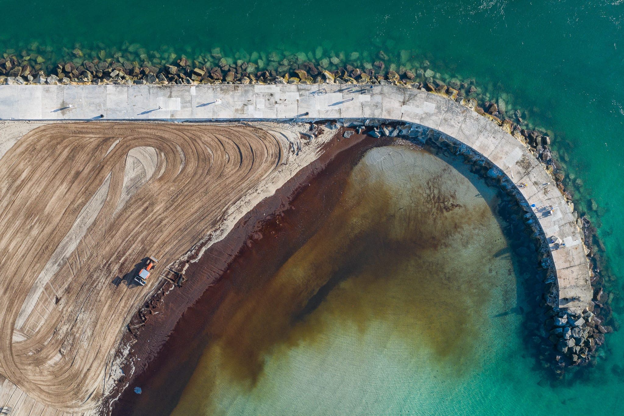 Aerial view of a coastline community — the breadth of a foundation portfolio seen from above