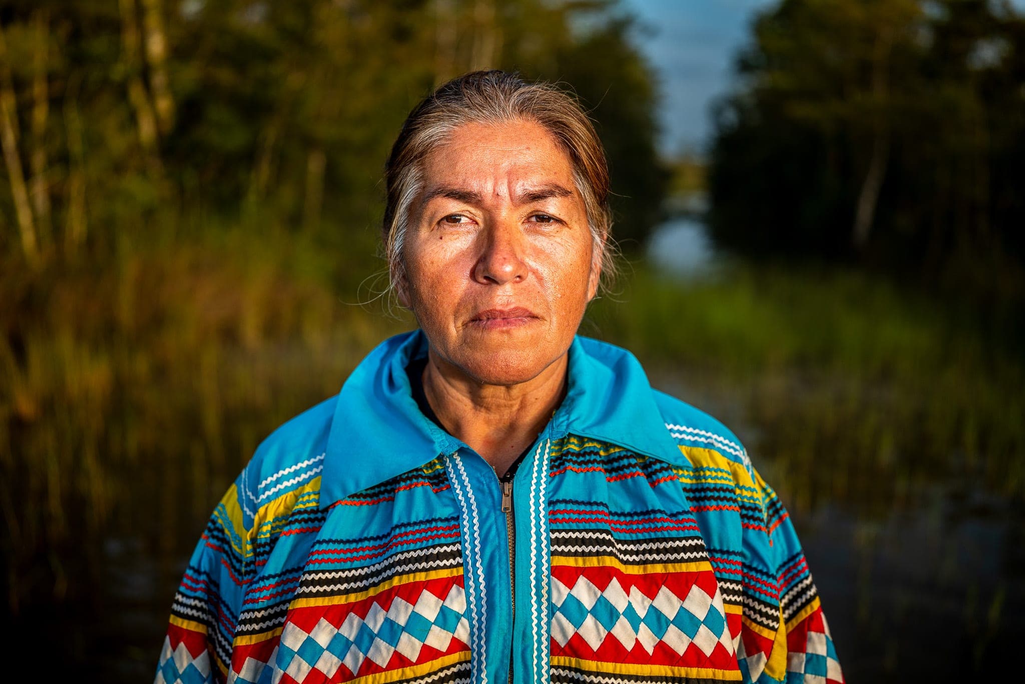 An elder photographed with quiet dignity — the real footage that anchors every storyboard panel